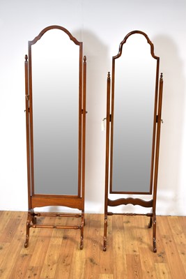 Lot 10 - Two elegant 20th-Century mahogany cheval mirrors