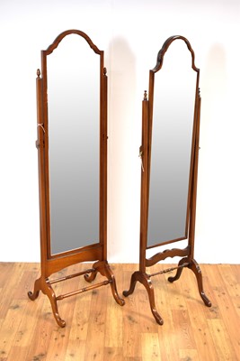Lot 10 - Two elegant 20th-Century mahogany cheval mirrors
