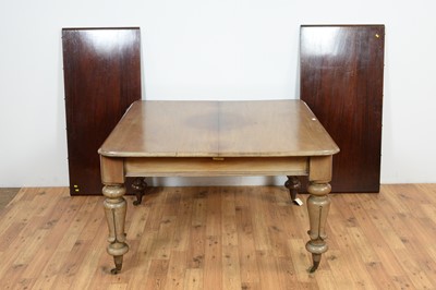 Lot 14 - A Victorian mahogany extending dining table.