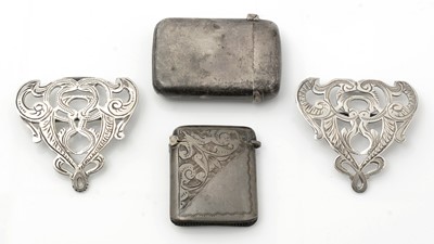 Lot 502 - An Edwardian silver vesta case;  another silver vesta case; and a silver two-piece buckle