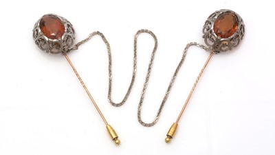 Lot 693 - A pair of Victorian citrine cloak pins