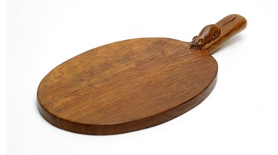 Lot 1332 - Robert 'Mouseman' Thompson, Kilburn: a carved oak cheese board