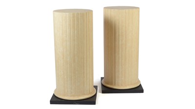 Lot 1304 - A pair of substantial Classical style cream painted wooden column form pedestals, 20th Century