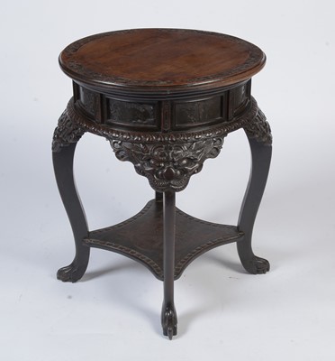 Lot 1470 - An ornate Chinese carved hardwood occasional table c1900