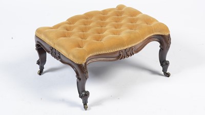 Lot 1302 - A Victorian mahogany serpentine buttoned footstool