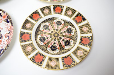 Lot 296 - A set of four Royal Crown Derby ‘Old Imari’ pattern circular plates; together with four other plates