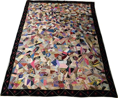 Lot 1189 - A Victorian crazy pattern patchwork quilt