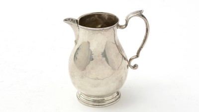 Lot 170 - An early George II silver North Country provincial sparrow-beak cream jug