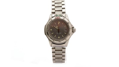 Lot 573 - Tag Heuer Professional: a steel cased quartz wristwatch