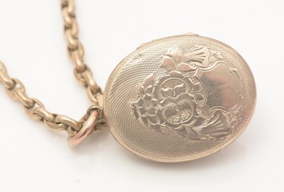 Lot 694 - A Victorian mourning locket on muff chain