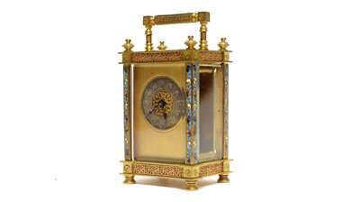 Lot 1261 - A late 19th Century French brass and champleve mantel clock, Richard & Co., Paris