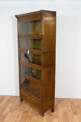 Lot 6 - An early 20th Century five tier oak Globe Wernicke style bookcase