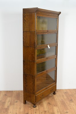 Lot 6 - An early 20th Century five tier oak Globe Wernicke style bookcase