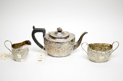 Lot 159 - A three piece silver tea service, by Carrington & Co