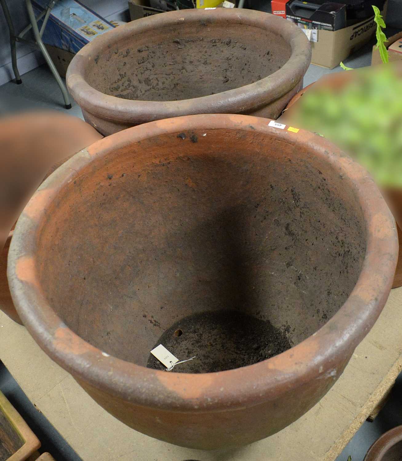 Lot 455 - A pair of salt glaze terracotta garden planters