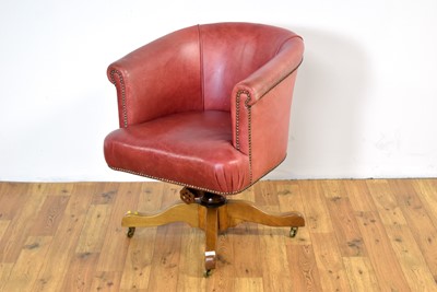 Lot 51 - A 20th Century swivel action office chair by Hillcrest