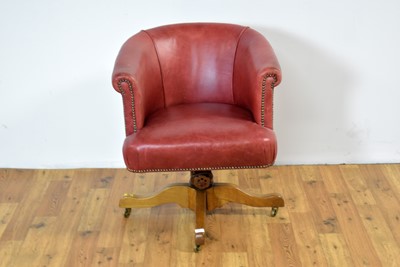 Lot 51 - A 20th Century swivel action office chair by Hillcrest