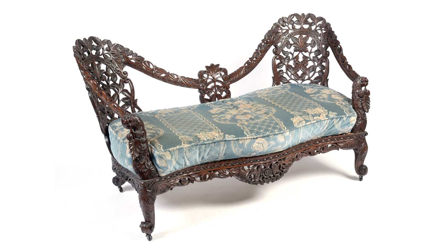 Lot 968 - A decorative late 19th Century Anglo-Indian carved hardwood two seater sofa