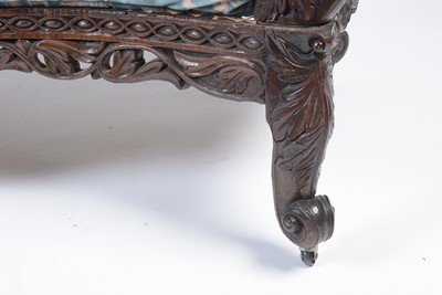 Lot 968 - A decorative late 19th Century Anglo-Indian carved hardwood two seater sofa