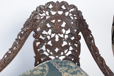 Lot 968 - A decorative late 19th Century Anglo-Indian carved hardwood two seater sofa