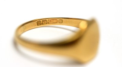 Lot 90 - A gold buckle ring; two gold signet rings; and another