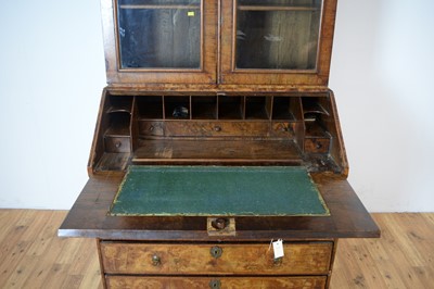 Lot 42 - A Queen Anne burr walnut and walnut bureau bookcase