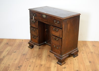 Lot 22 - A mid 18th Century mahogany kneehole desk with secretaire drawer