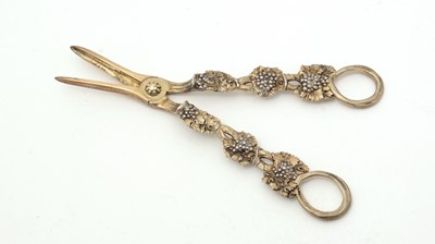 Lot 347 - A pair of George IV cast silver parcel-gilt grape shears