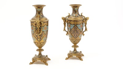 Lot 1280 - A pair of 19th Century French champleve enamel garniture vases