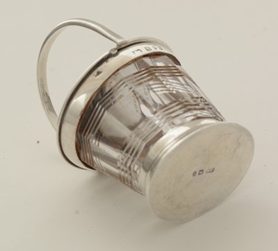 Lot 43 - A late Victorian small silver mounted cut-glass mustard pot