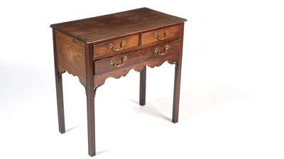 Lot 1373 - A Georgian  mahogany lowboy