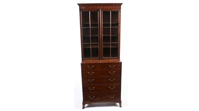 Lot 1380 - A Georgian mahogany secretaire bookcase