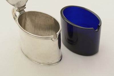 Lot 53 - A matched pair of George III silver mustard pots