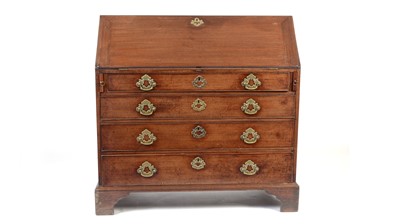 Lot 1390 - A George III mahogany bureau