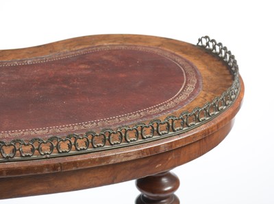 Lot 1398 - An attractive Victorian burr walnut kidney-shaped writing table