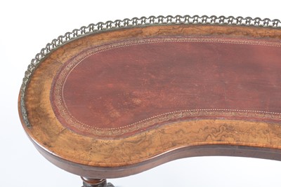 Lot 1398 - An attractive Victorian burr walnut kidney-shaped writing table