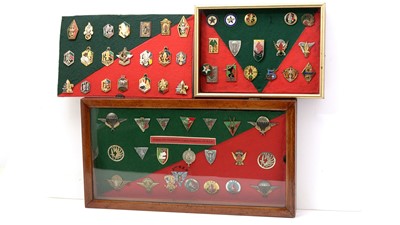 Lot 1045 - A collection of insignes, badges, promotion badges and effects