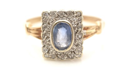 Lot 741 - A sapphire and diamond cluster ring
