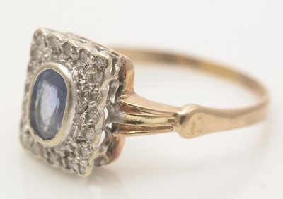 Lot 495 - A sapphire and diamond cluster ring