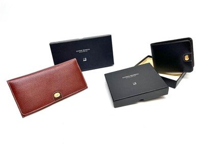 Lot 1182 - Two Dunhill leather wallets