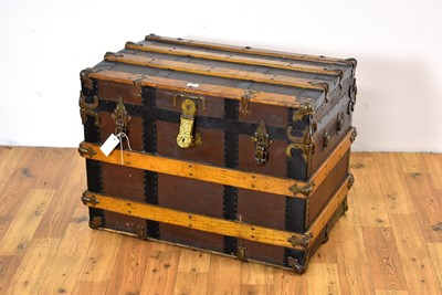 Lot 85 - A vintage oak, brass and metal-bound cabin trunk