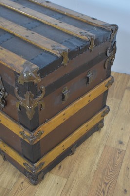 Lot 85 - A vintage oak, brass and metal-bound cabin trunk