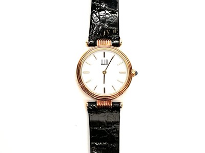 Lot 1177 - An Alfred Dunhill lady's gold-plated dress watch