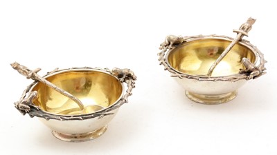 Lot 193 - A cased pair of Victorian Scottish silver salts with matching spoons