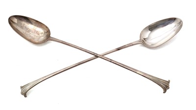 Lot 323 - A pair of George III silver basting spoons