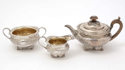 Lot 196 - A late George III three piece silver tea service