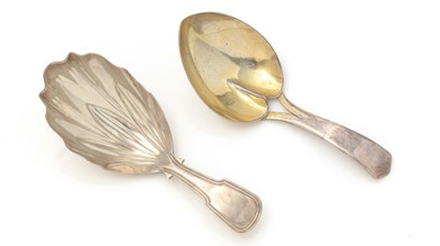 Lot 373 - A George III silver caddy spoon; and another