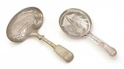 Lot 376 - A Victorian engraved silver caddy spoon; and another