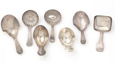 Lot 377 - Seven various George III silver caddy spoons