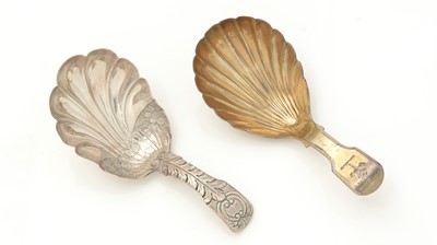 Lot 384 - A George III silver-gilt caddy spoon; and another